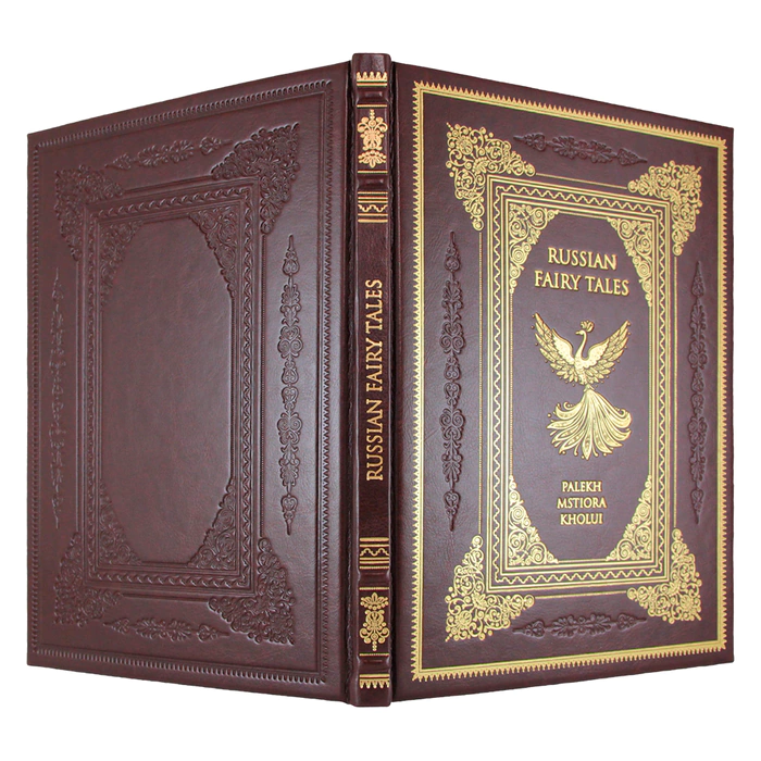 The leather-bound book "Russian folk tales. Palekh, mstera, lackey" in English